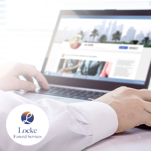 Person on laptop looking at burred screen of a social media page